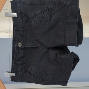 Low-rise faded black trouser shorts